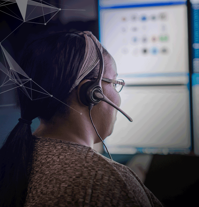 Photo of telecommunicator. MCP helps public-safety agencies safeguard land mobile radio systems from cyber threats.