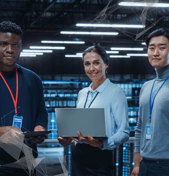Photo of three people in a room of servers. MCP's VCISO service helps organizations manage their cybersecurity program.
